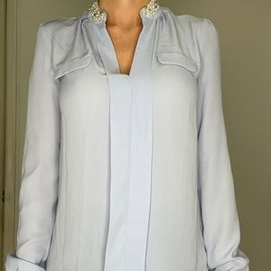 Soft purple blouse with pearl collar